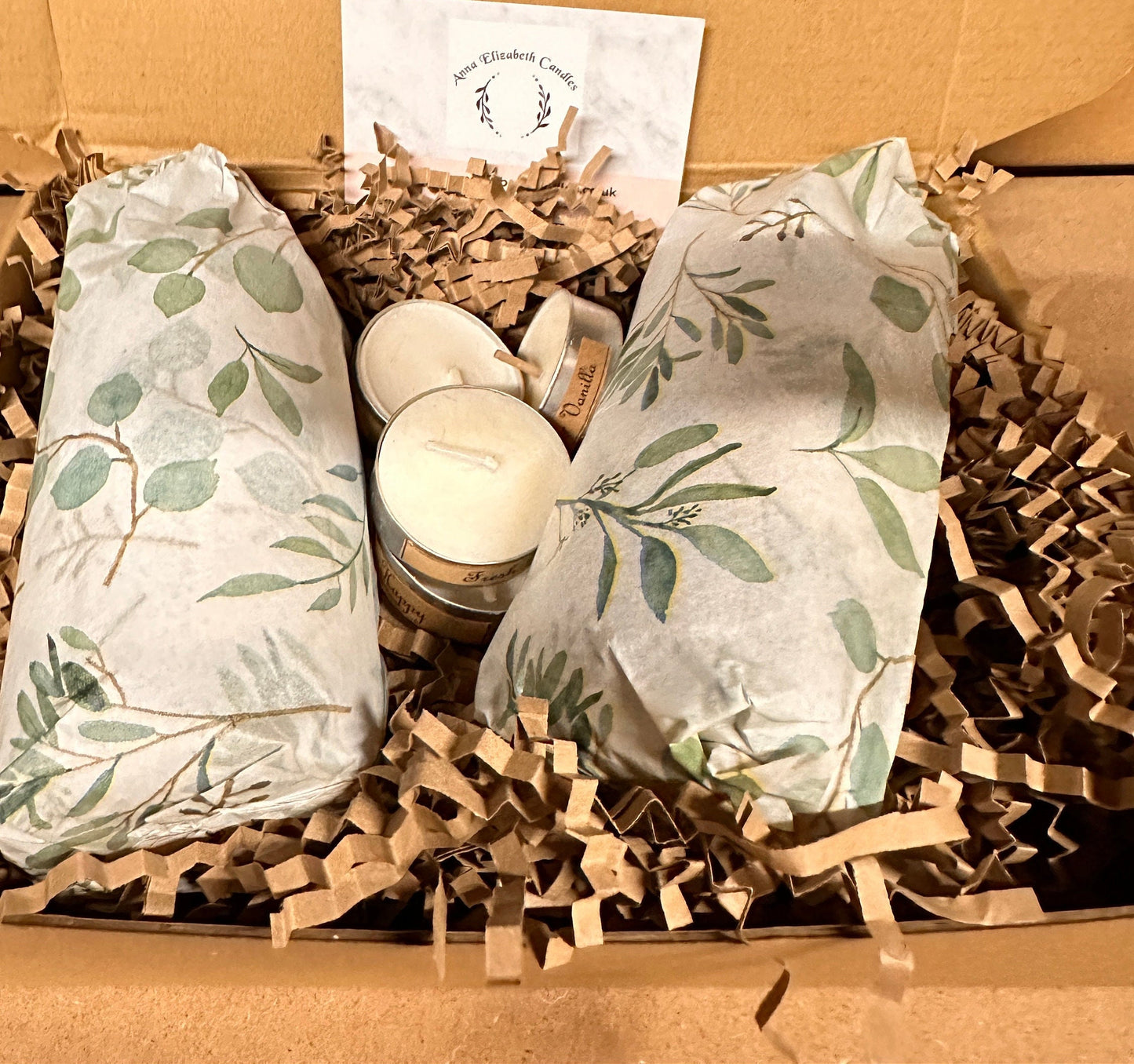 A carefully packed order, ready to go! Each item is wrapped in our signature tissue paper and packaged with recyclable materials. We take pride in ensuring your order arrives safely and sustainably.